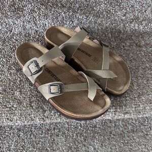 Sandals never worn outside .like new condition